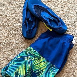 Brand new swim trunks and wet shoes.